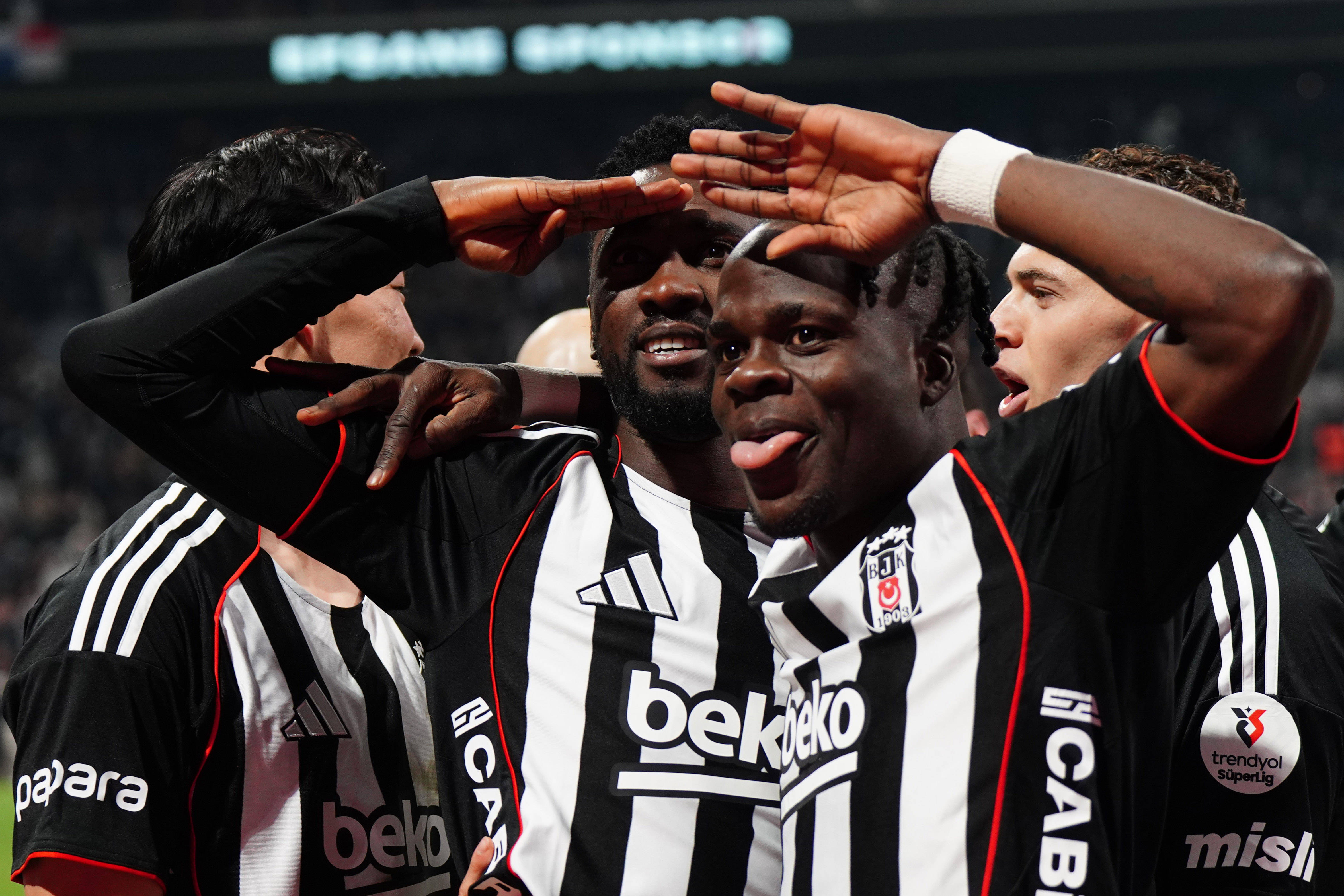 Wilfred Ndidi 4 of Besiktas celebrates after scoring the first goal of his team with Junior Olaitan R during the Trendyol Turkish Süper League match between Besiktas JK and Göztepe SK.