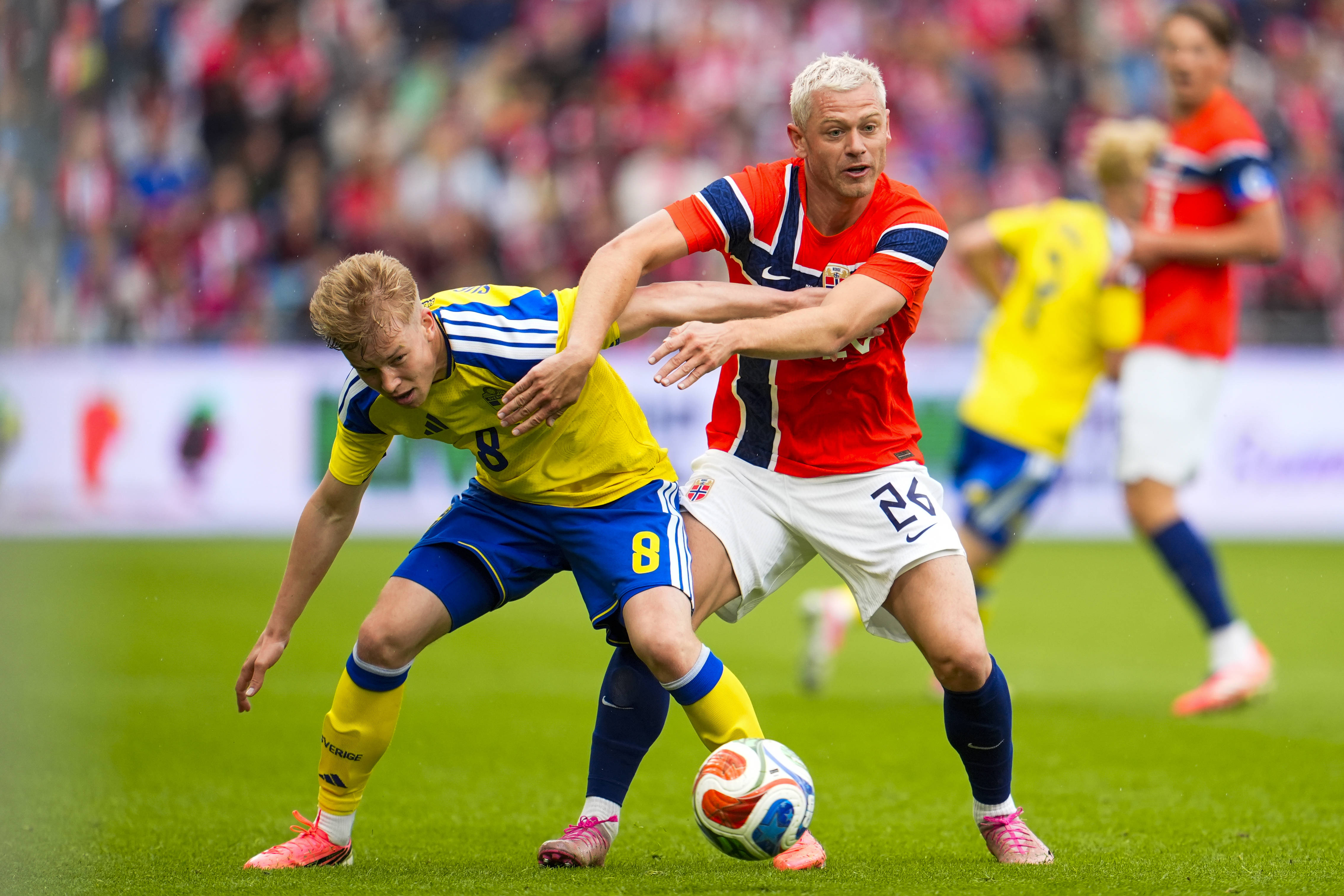 Julian Ryerson tackles Daniel Svensson